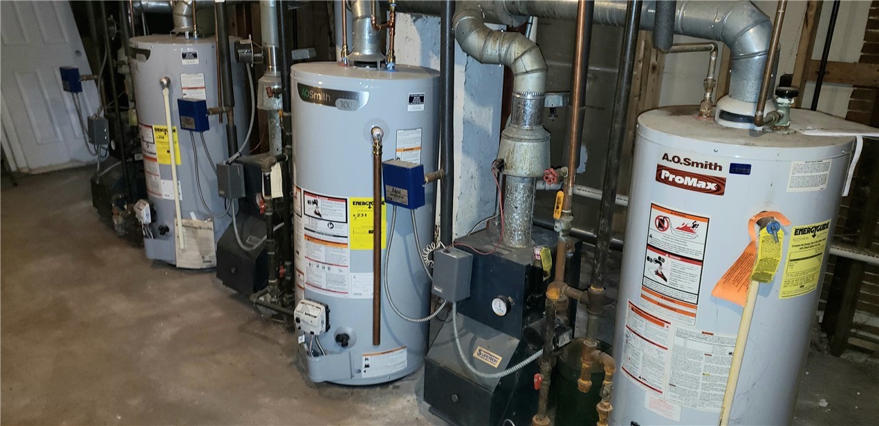 404 Carrington Avenue Woonsocket, RI 02895 - Photo 34 of 36 Basement Utility Rm Boilers & HW tanks