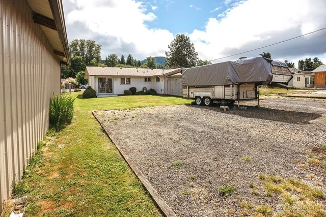 a view of a house with a swimming pool