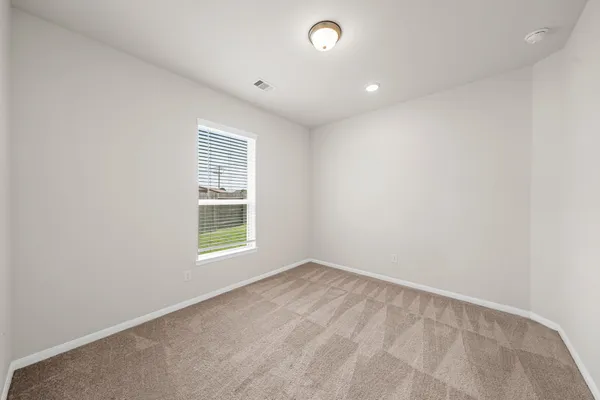 an empty room with a window