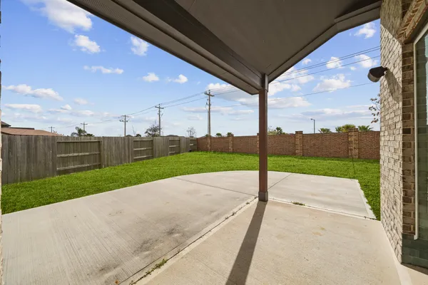a view of a road with yard
