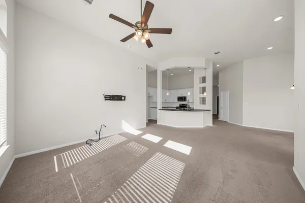 a view of a livingroom with a furniture