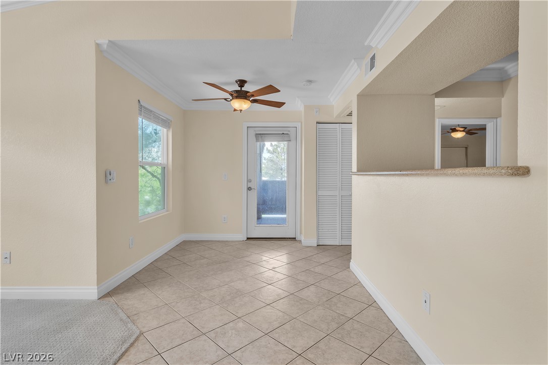 8101 West Flamingo Road, Unit 2001 Las Vegas, NV 89147 - Photo 14 of 28 Ceramic tile flooring spans this versatile room, featuring a window with outdoor views and access to a closet.