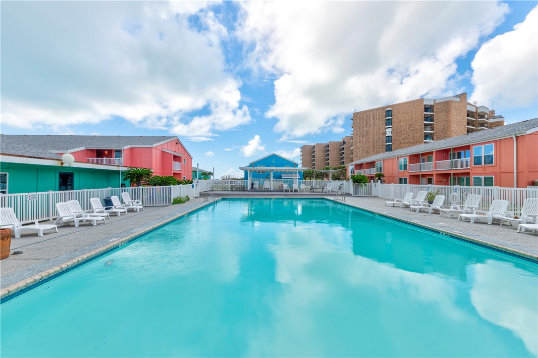 800 Beach Access Road, Unit 111 Port Aransas, TX 78373 - Photo 20 of 30 a swimming pool view with a outdoor seating