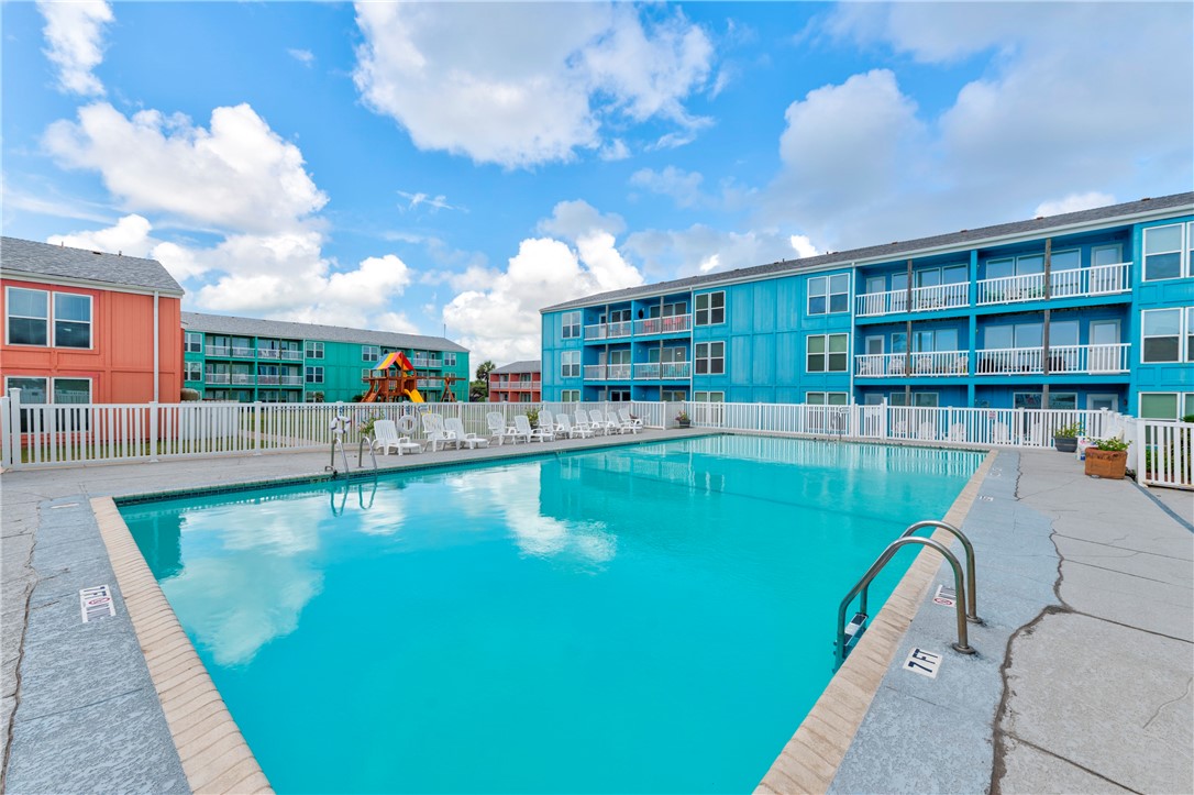 800 Beach Access Road, Unit 111 Port Aransas, TX 78373 - Photo 21 of 30 a swimming pool view with a outdoor seating space