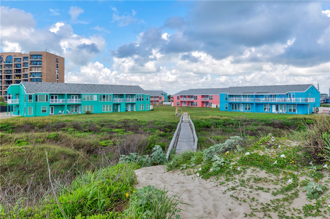 800 Beach Access Road, Unit 111 Port Aransas, TX 78373 - Photo 26 of 30 a view of a house with a yard