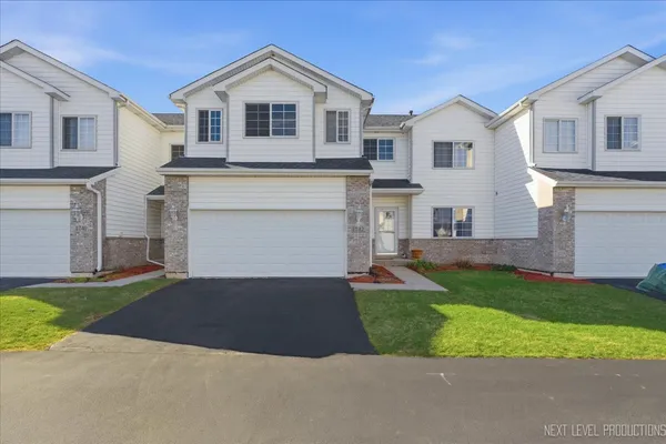 $310,000 | 1742 Waters Edge Drive, Unit 1742, Minooka, IL 60447
