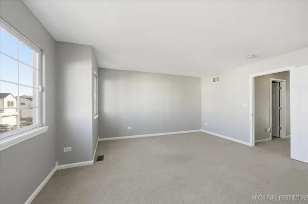 $310,000 | 1742 Waters Edge Drive, Unit 1742, Minooka, IL 60447