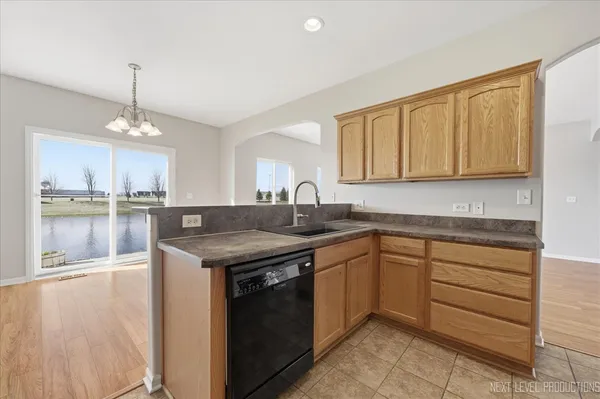 $310,000 | 1742 Waters Edge Drive, Unit 1742, Minooka, IL 60447