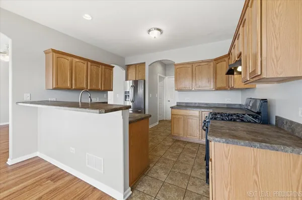 $310,000 | 1742 Waters Edge Drive, Unit 1742, Minooka, IL 60447