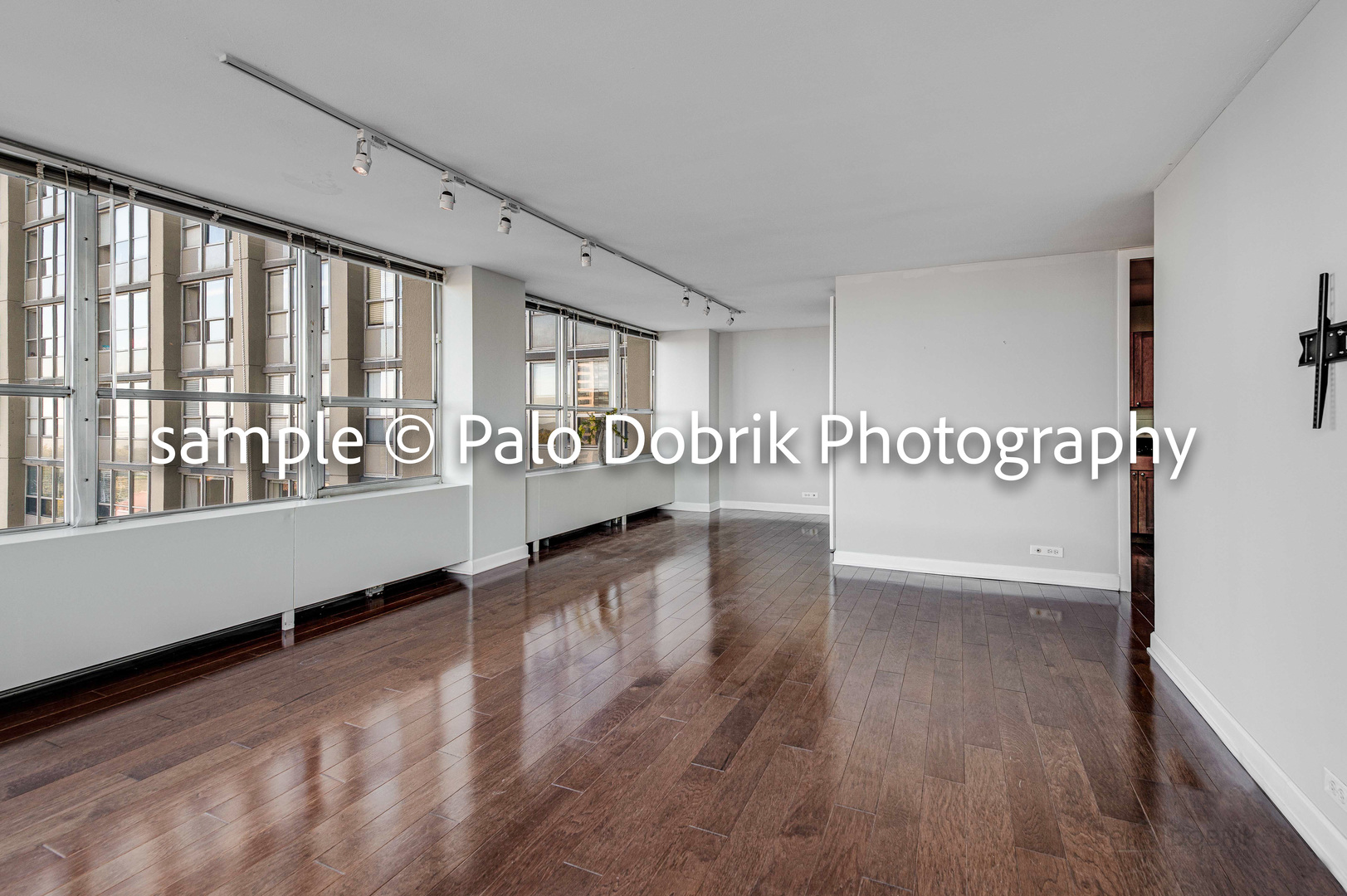 655 West Irving Park Road, Unit 1110 Chicago, IL 60613 - Photo 18 of 30 a view of an entryway with wooden floor