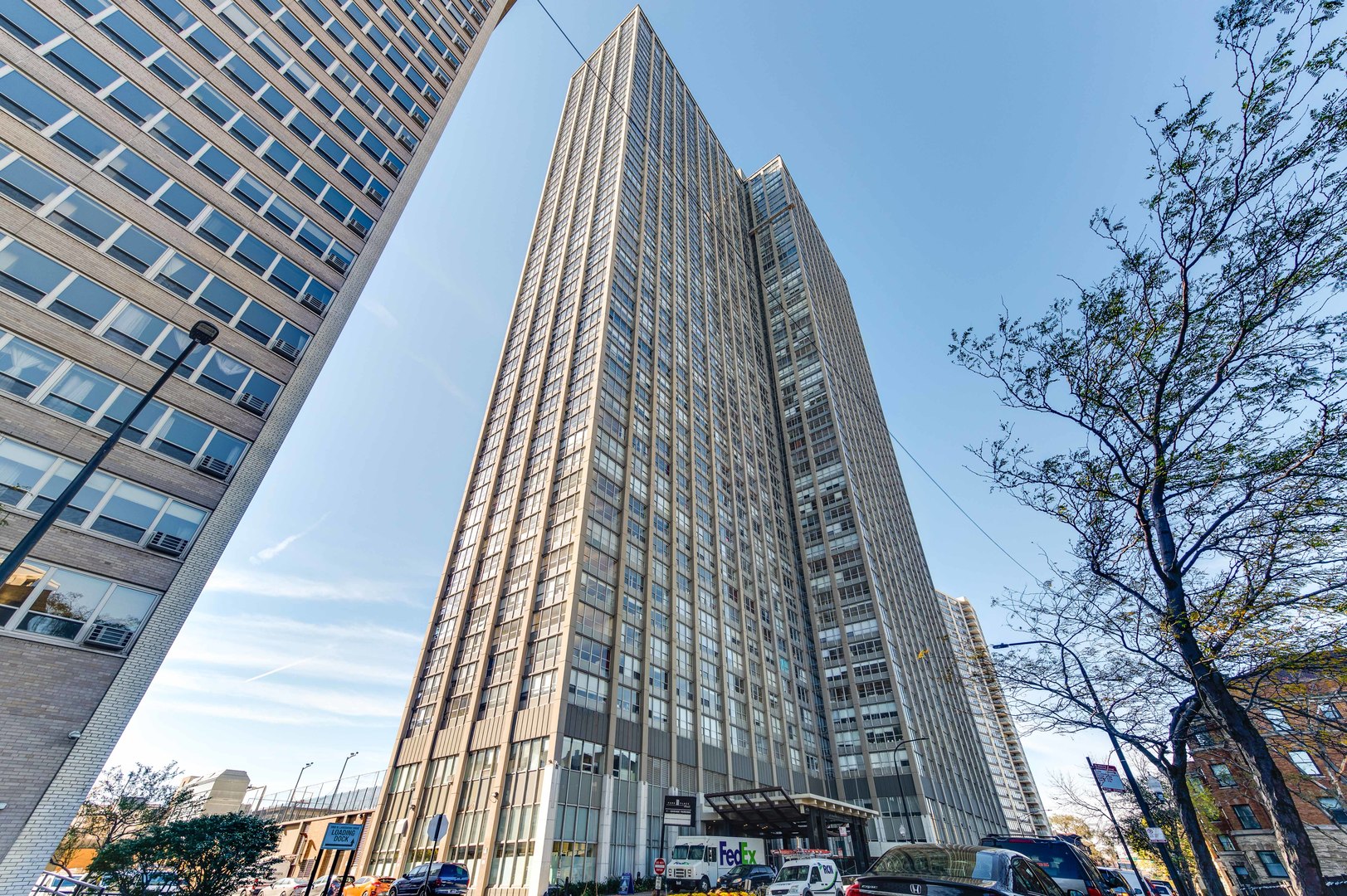655 West Irving Park Road, Unit 1110 Chicago, IL 60613 - Photo 3 of 30 a view of a tall building