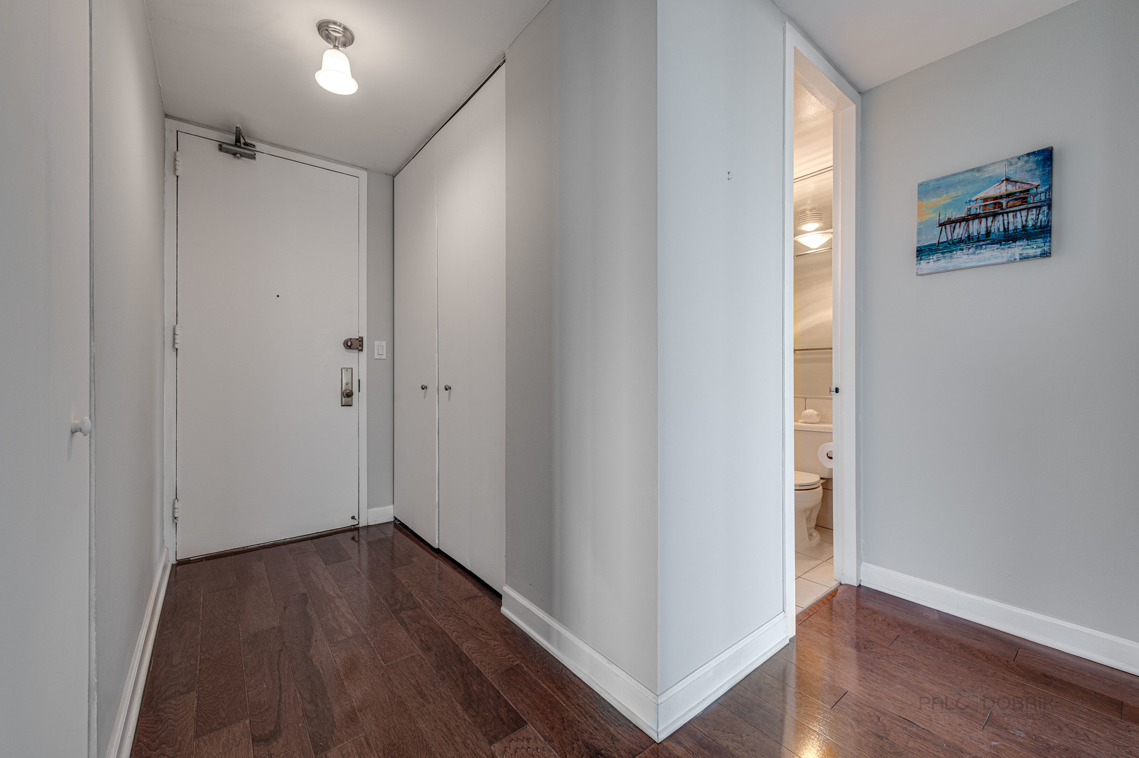 655 West Irving Park Road, Unit 1110 Chicago, IL 60613 - Photo 9 of 30 a view of an empty room with wooden floor