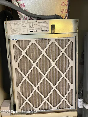 a view of a air conditioner and a table