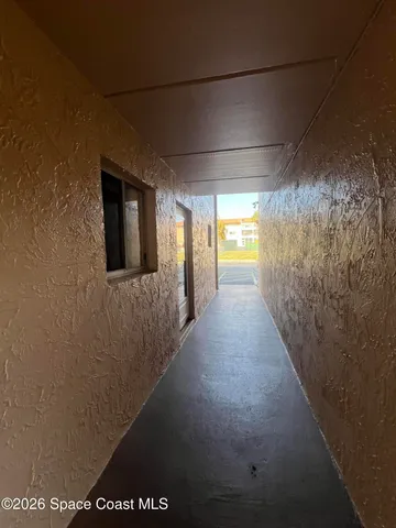 a view of hallway with window