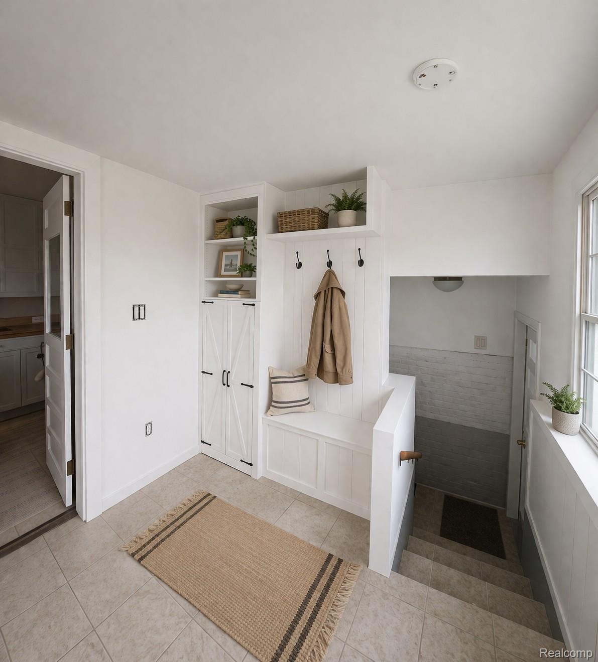 5815 Chicago Road Warren, MI 48092 - Photo 39 of 47 Mudroom with light tile patterned floors and baseboards