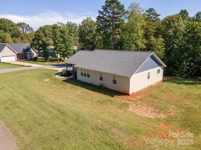 a house view with a garden space