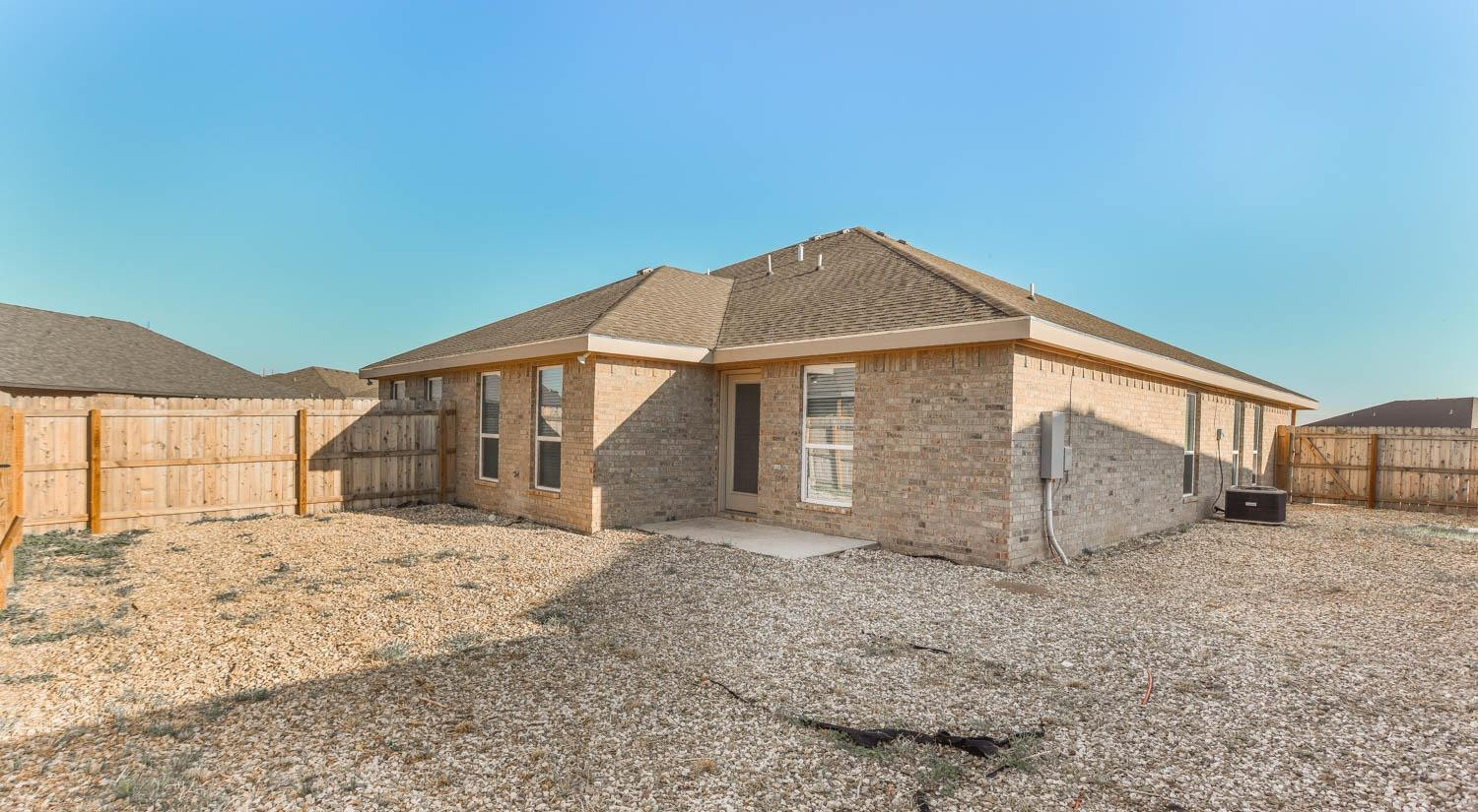 1107 North Englewood Avenue Lubbock, TX 79416 - Photo 15 of 16 a view of a house with a yard