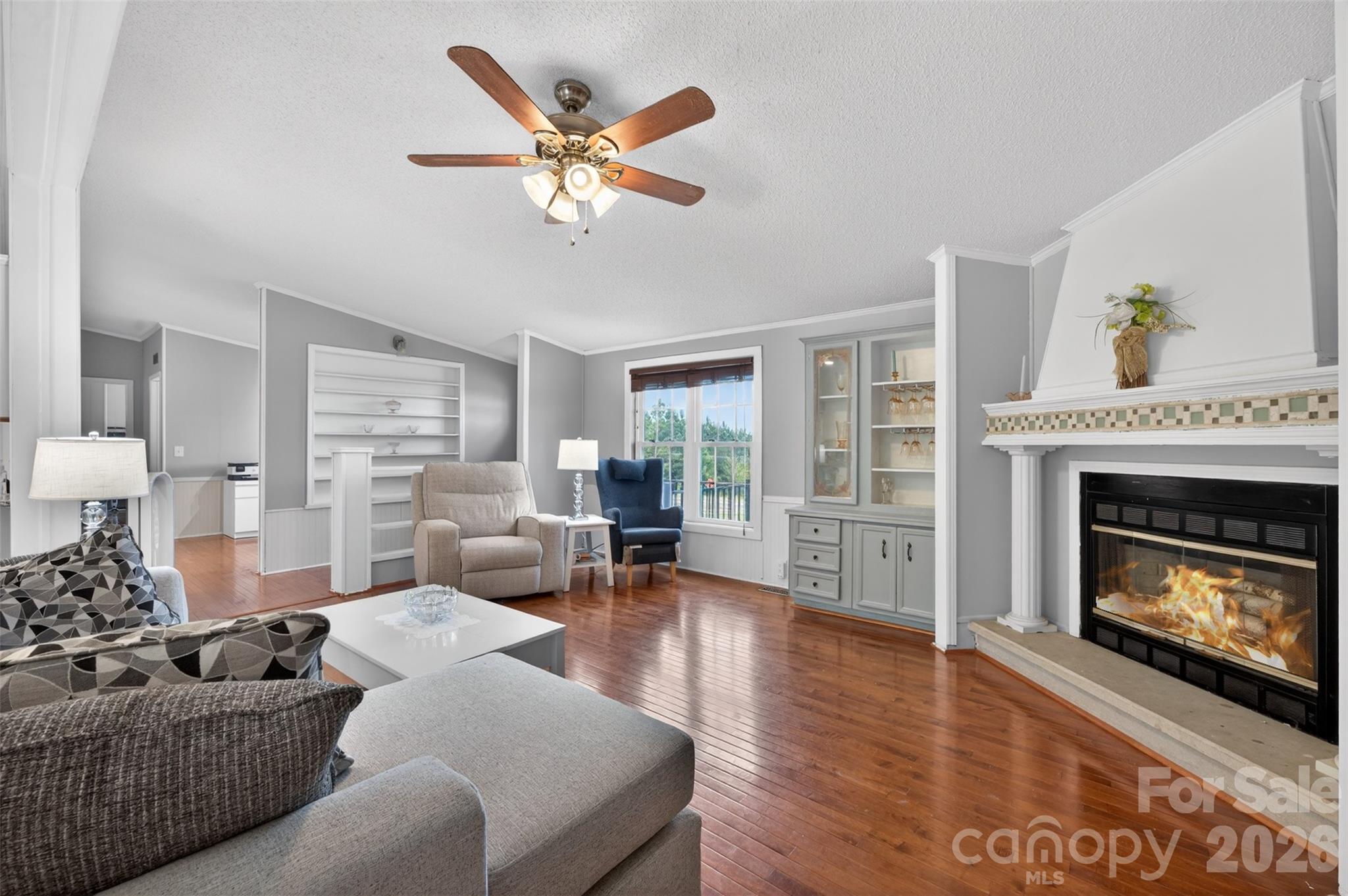 4352 Anderson Mountain Road Maiden, NC 28650 - Photo 6 of 42 a living room with furniture and a fireplace