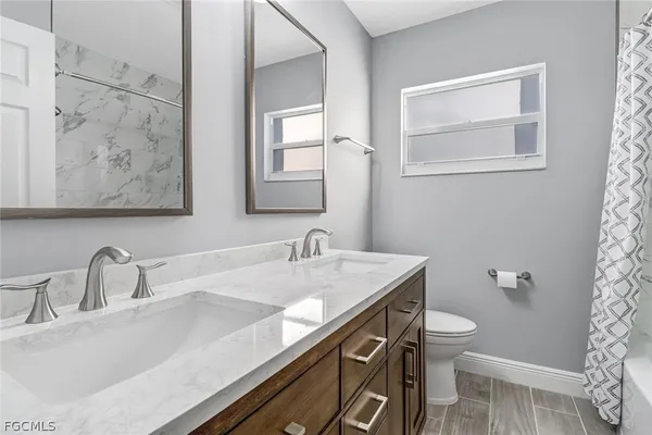 a bathroom with a sink and a toilet