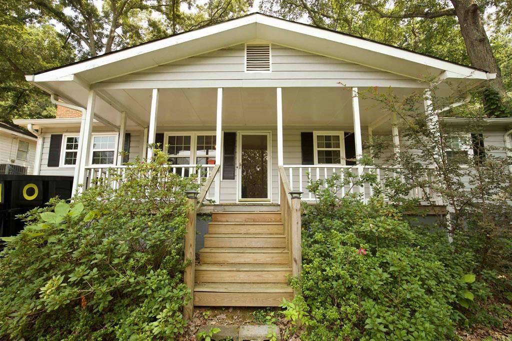 209 Alfred Avenue Southeast Rome, GA 30161 - Photo 1 of 1 a front view of a house with a yard