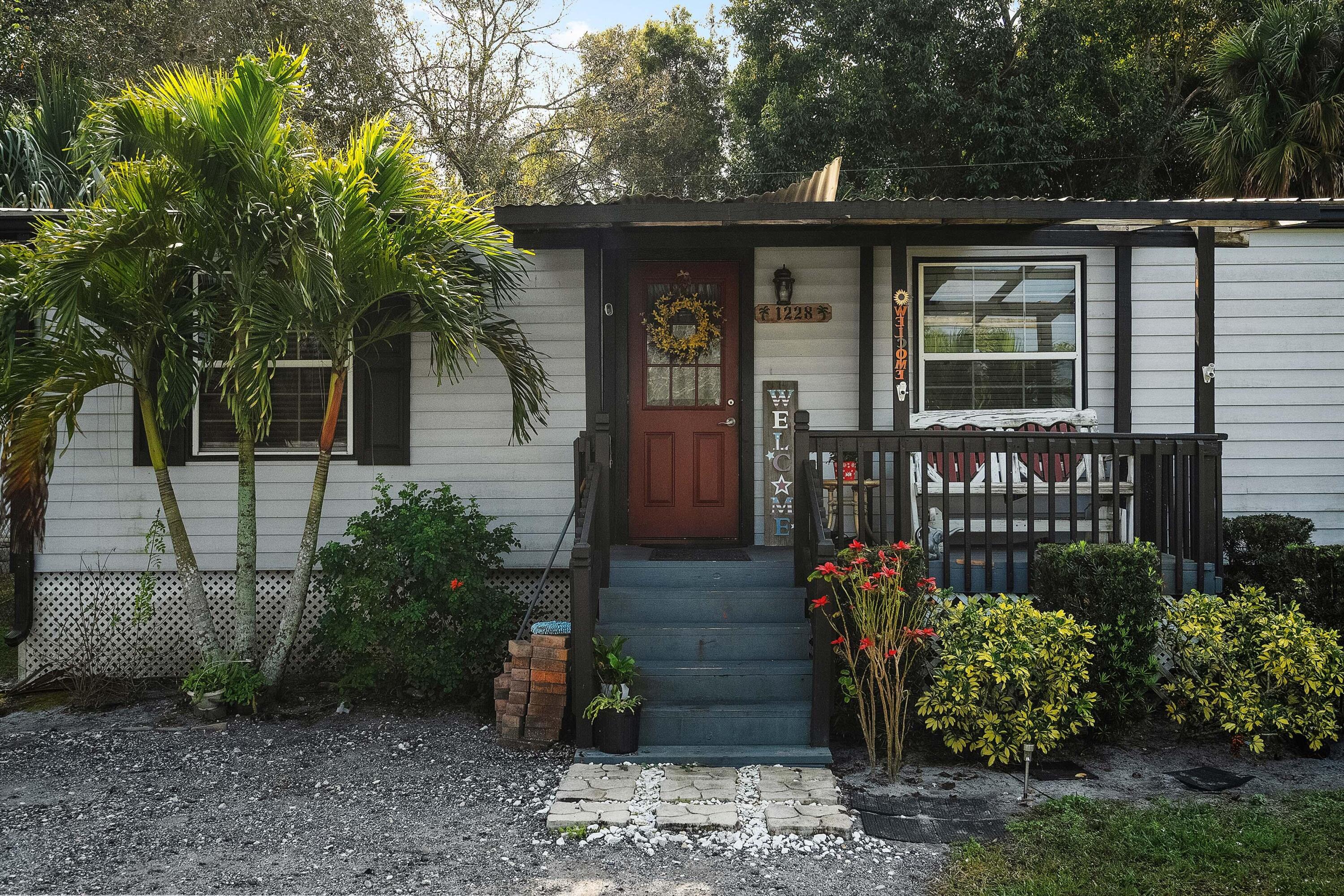 1228 Southwest Buckskin Trail Stuart, FL 34997 - Photo 2 of 20 beyc67aceee32dc53