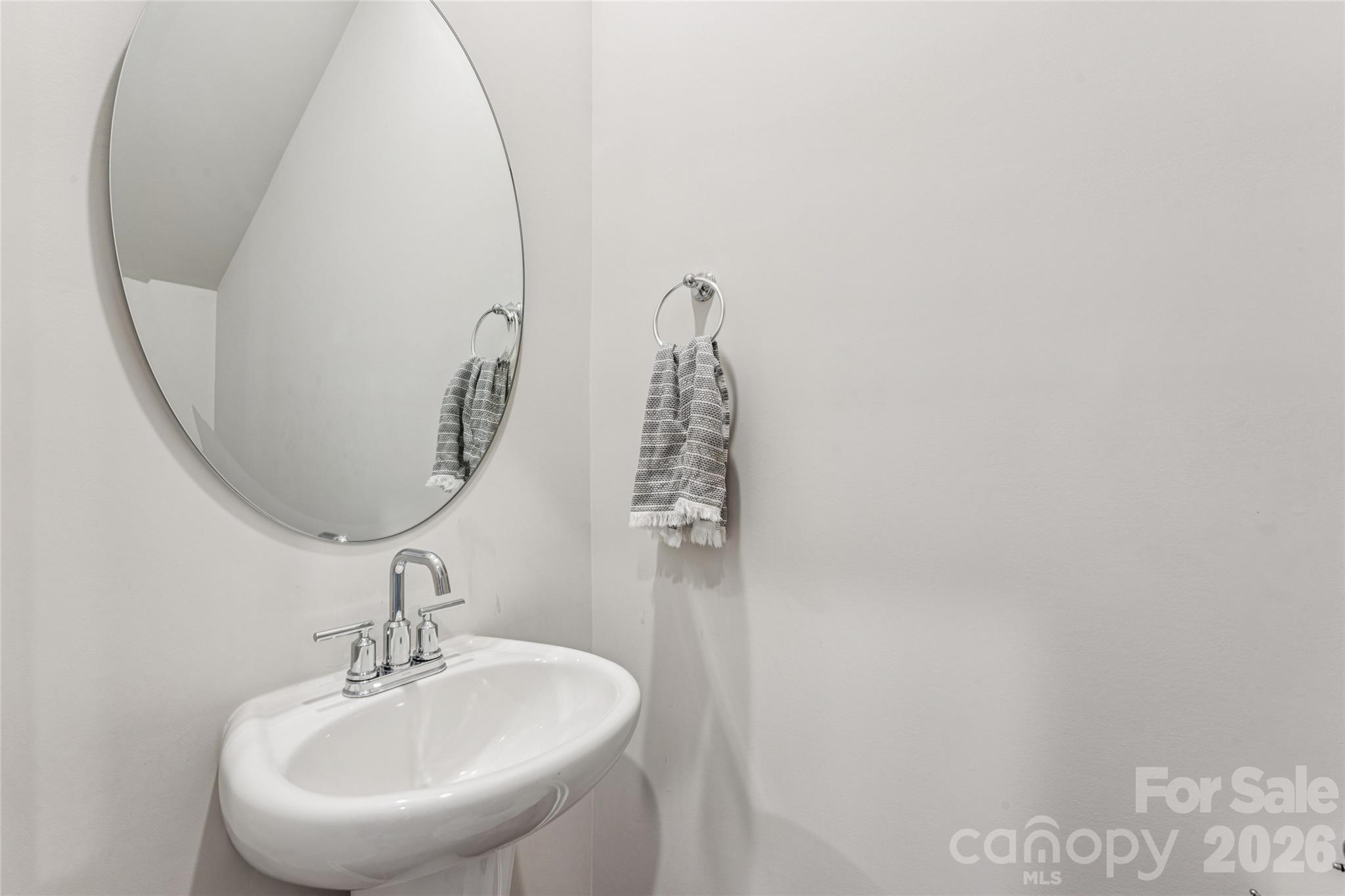 309 Olympia Way York, SC 29745 - Photo 16 of 46 a bathroom with a sink and a mirror