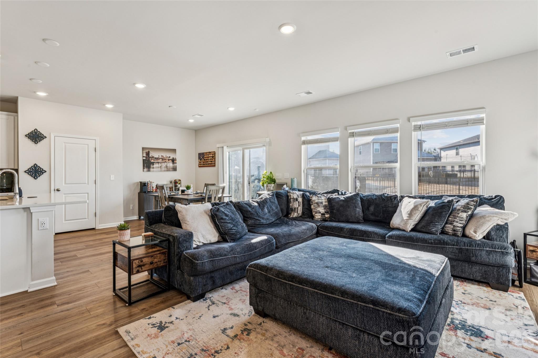 309 Olympia Way York, SC 29745 - Photo 19 of 46 a living room with furniture and a wooden floor