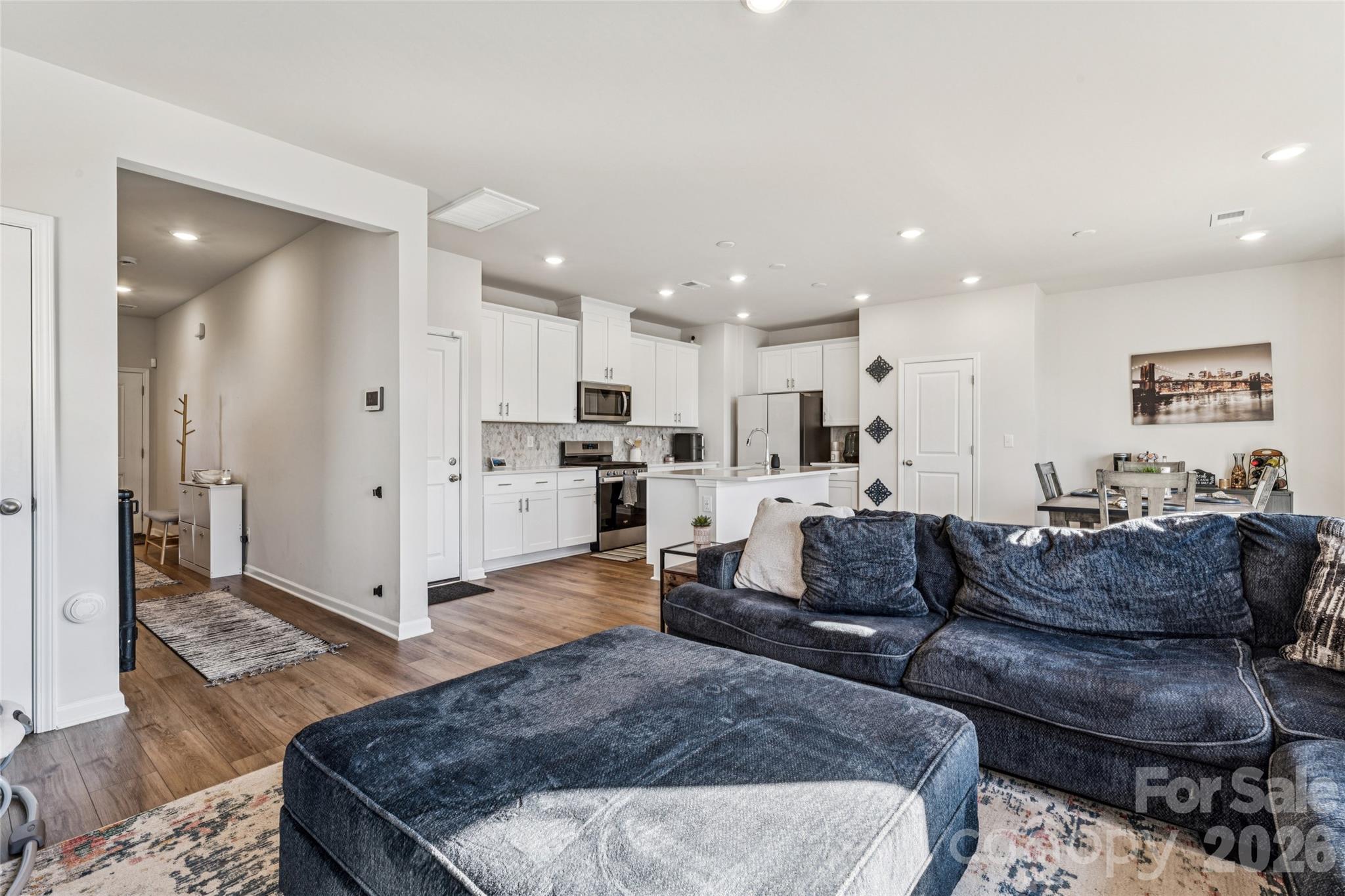 309 Olympia Way York, SC 29745 - Photo 20 of 46 a living room with furniture and kitchen view