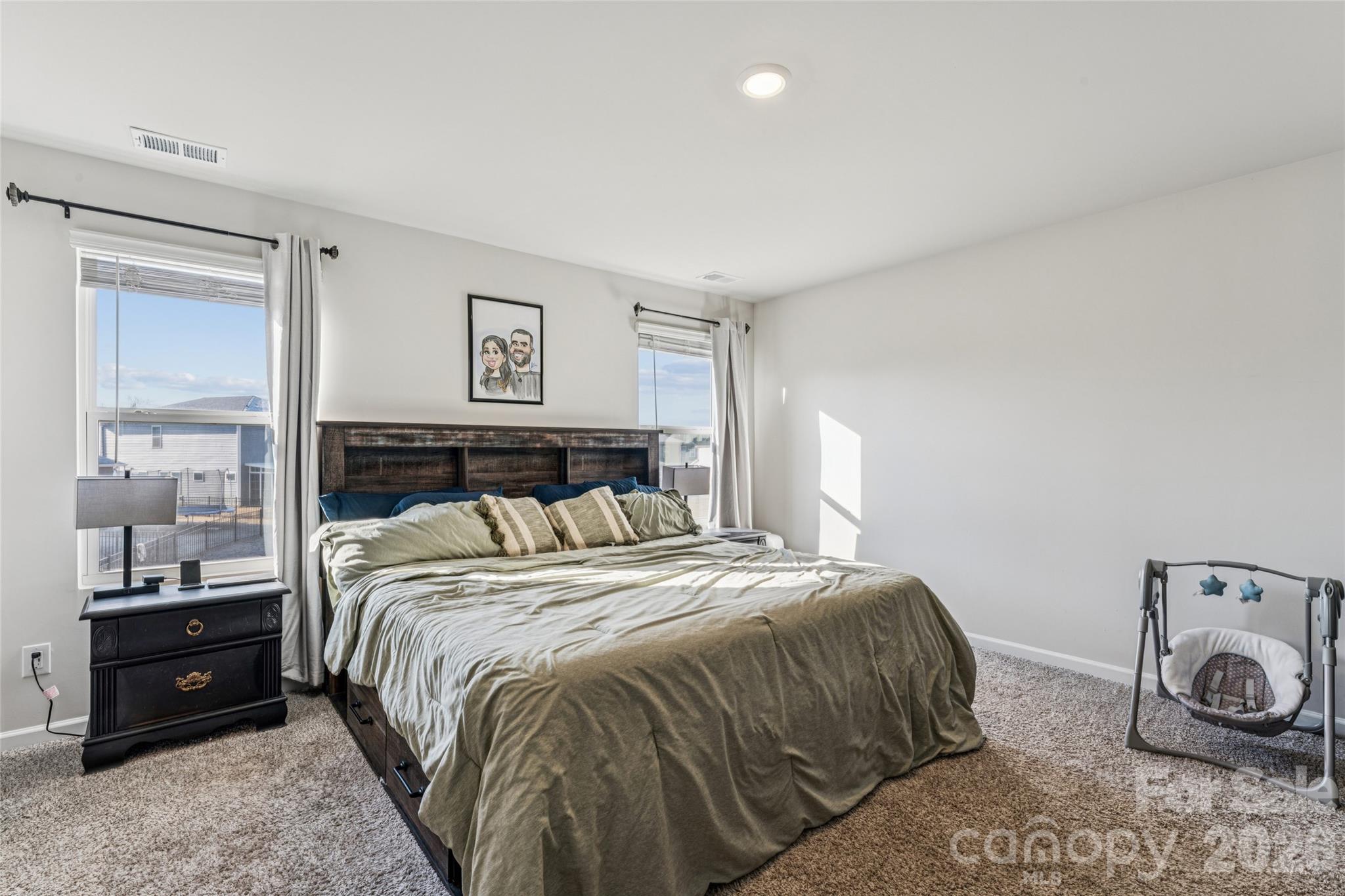 309 Olympia Way York, SC 29745 - Photo 21 of 46 a bedroom with a bed and a closet