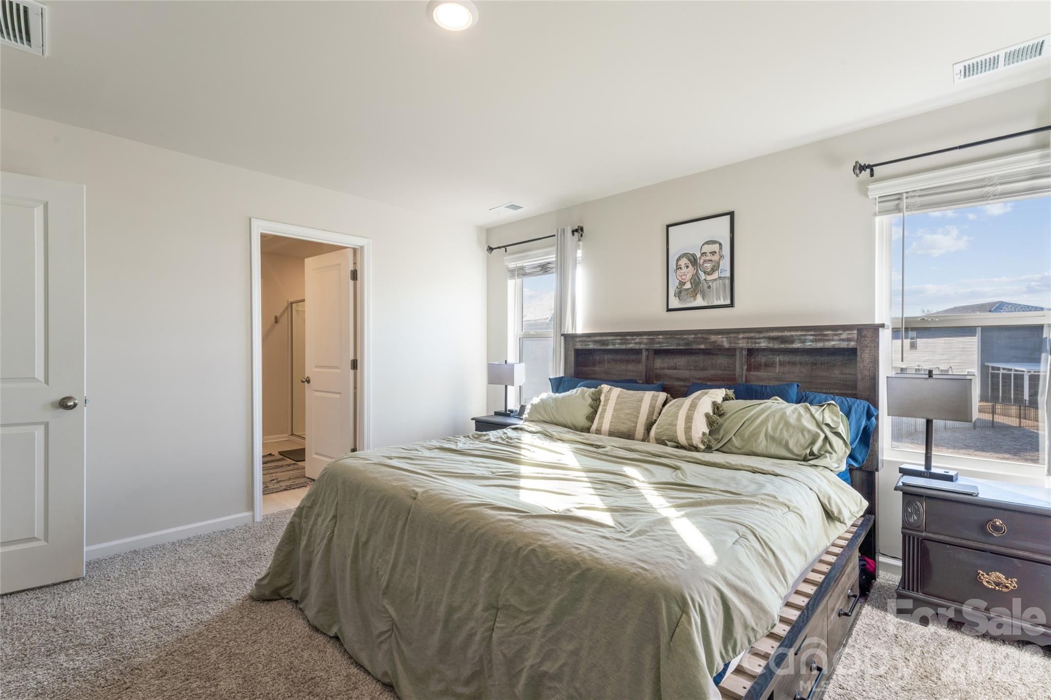 309 Olympia Way York, SC 29745 - Photo 22 of 46 a bedroom with a bed and window