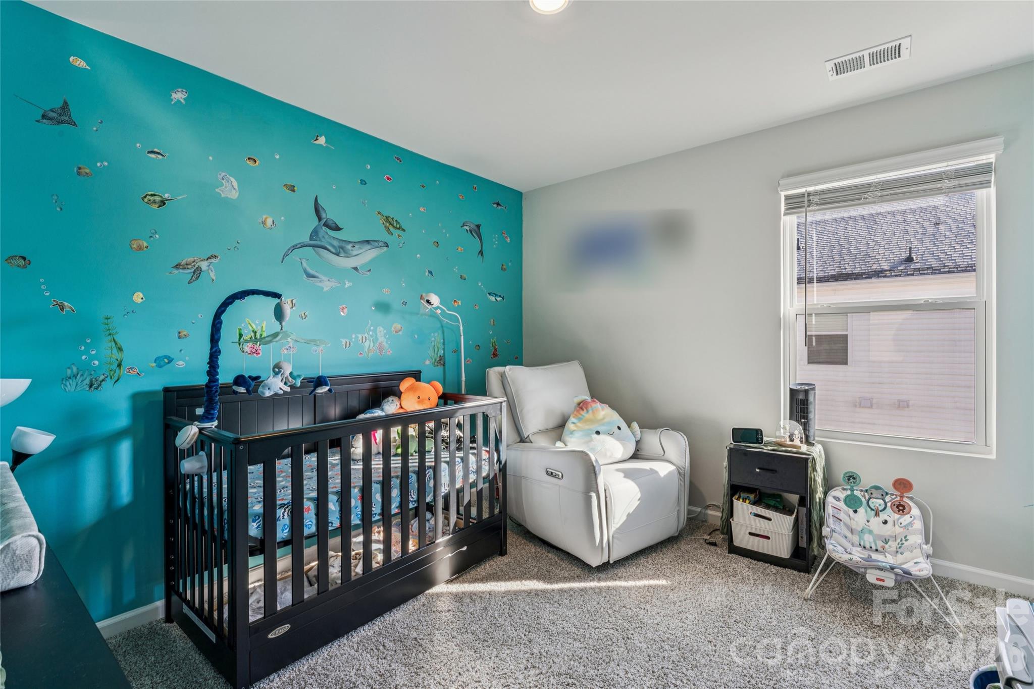 309 Olympia Way York, SC 29745 - Photo 37 of 46 a bed room with furniture and a window