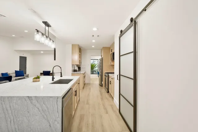 a kitchen with counter top space and a sink