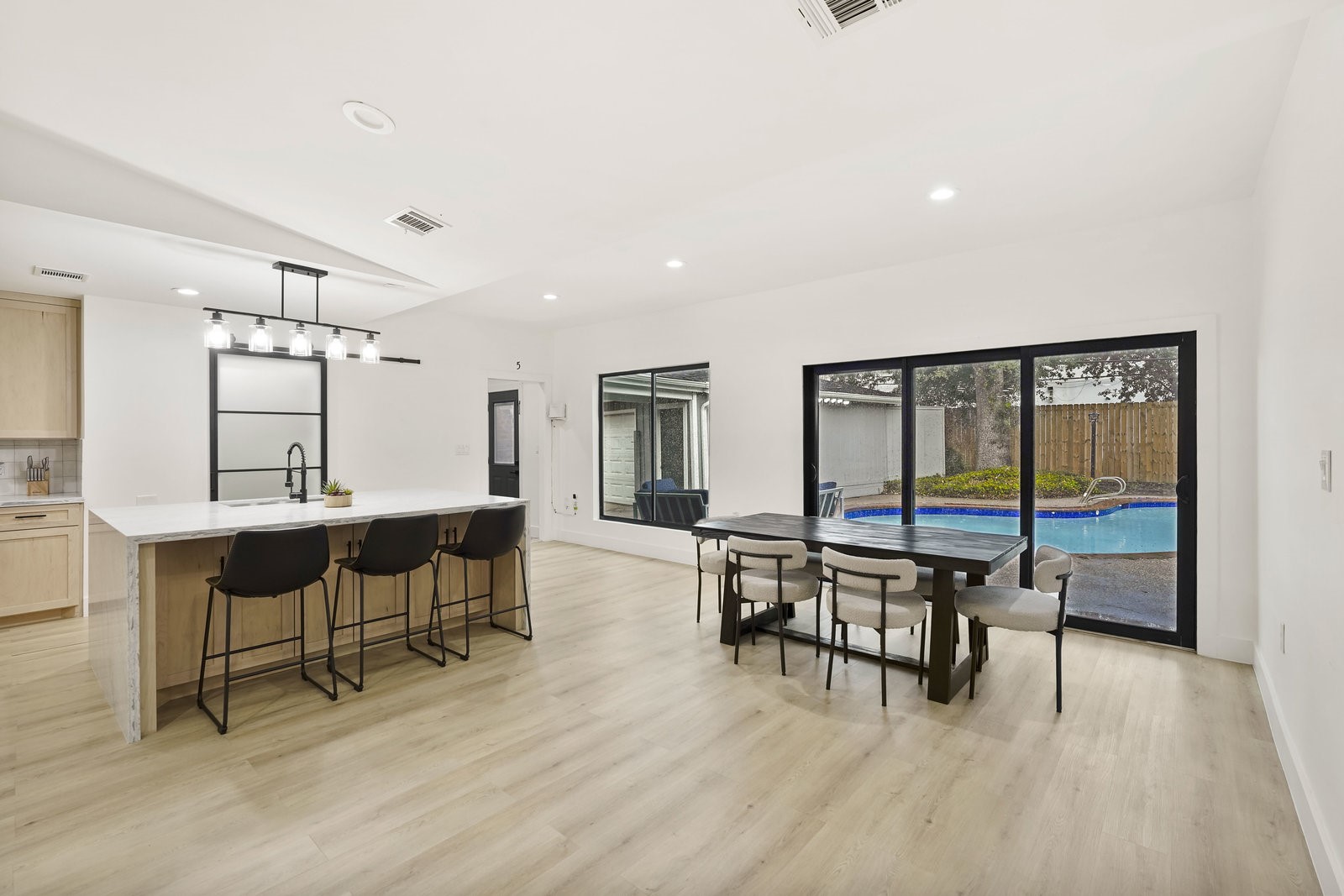 3327 Freshmeadows Drive Houston, TX 77063 - Photo 13 of 35 a view of a a dining room with furniture window and wooden floor