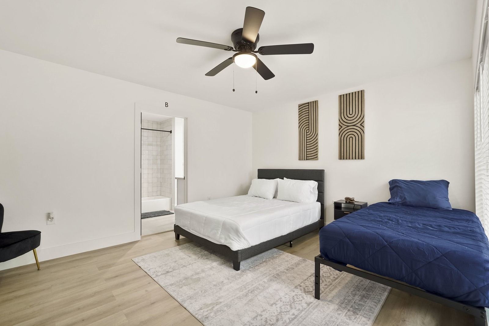 3327 Freshmeadows Drive Houston, TX 77063 - Photo 16 of 35 a bedroom with a bed chandelier and a window