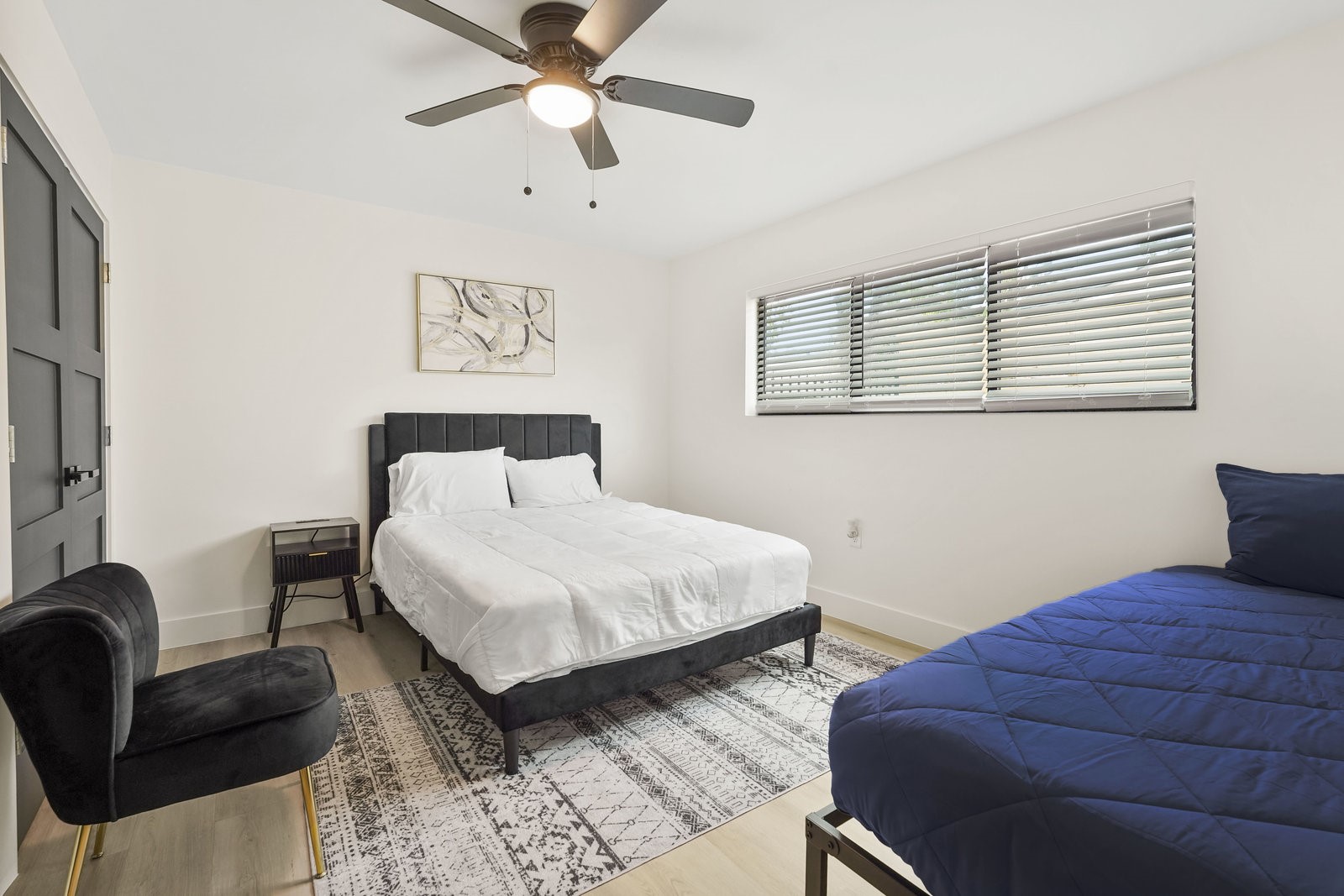 3327 Freshmeadows Drive Houston, TX 77063 - Photo 19 of 35 a bedroom with a bed and a couch