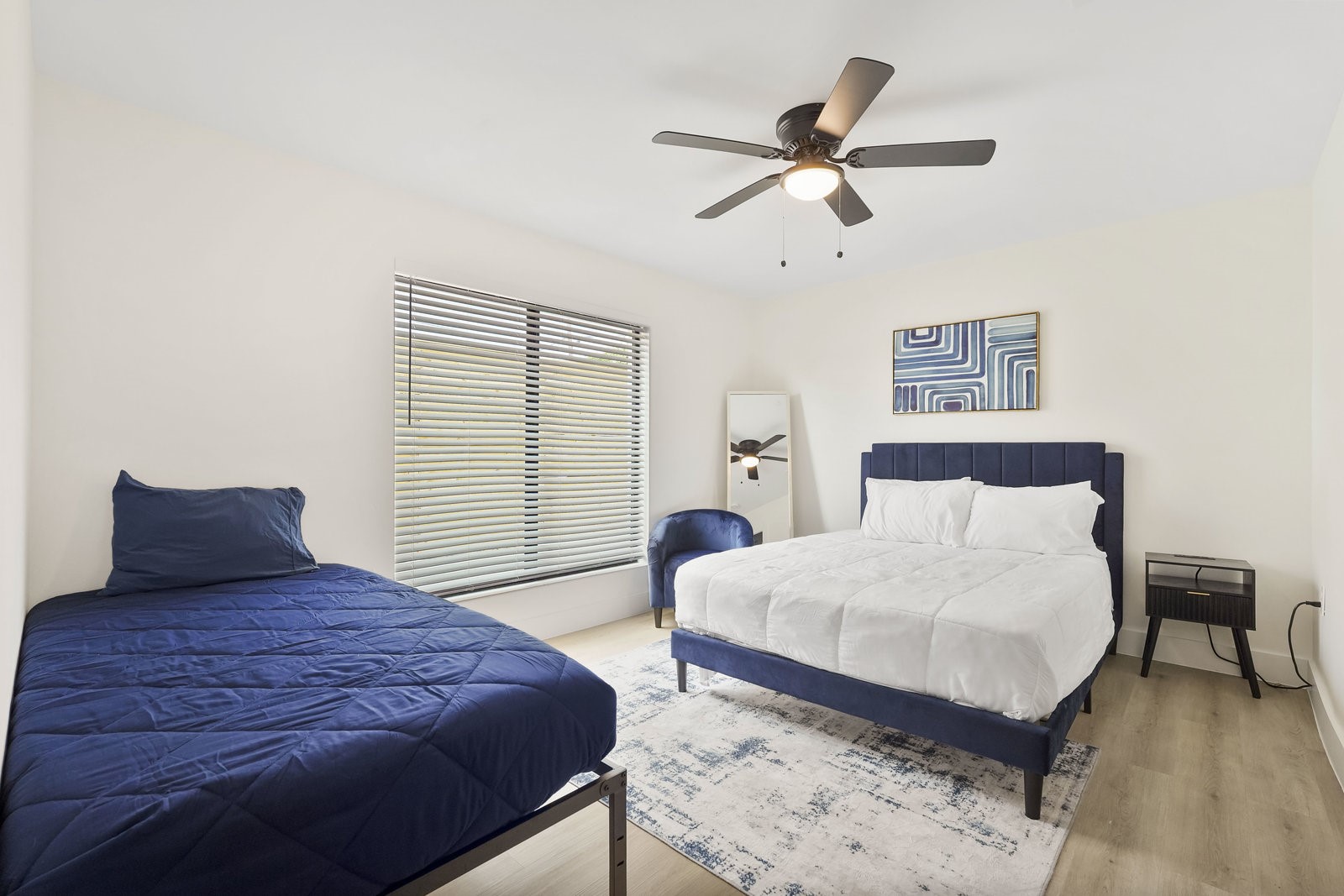 3327 Freshmeadows Drive Houston, TX 77063 - Photo 22 of 35 a bedroom with a bed and window