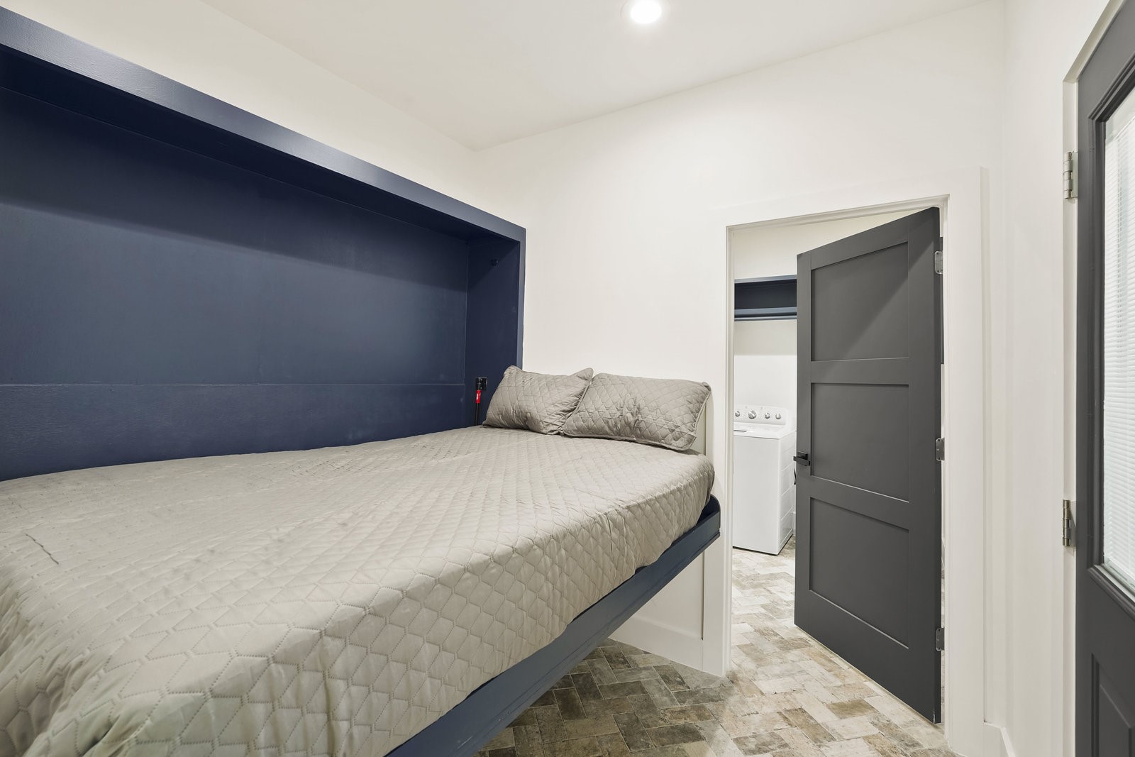 3327 Freshmeadows Drive Houston, TX 77063 - Photo 24 of 35 a bedroom with a bed and a refrigerator