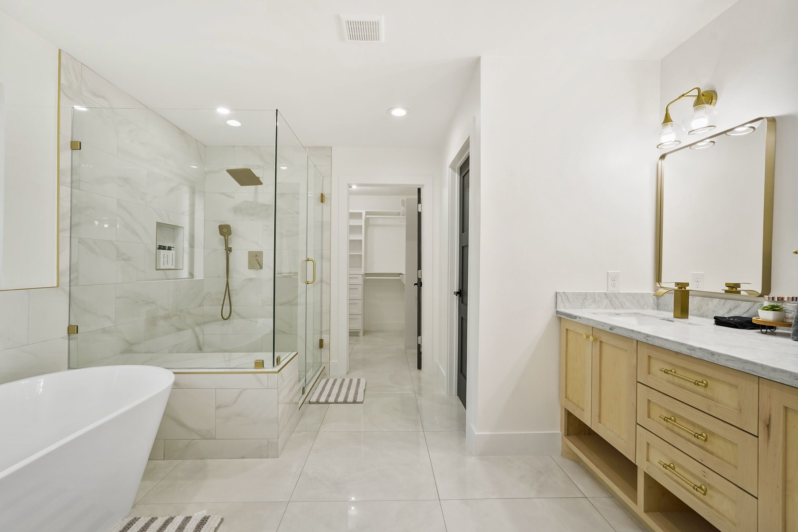 3327 Freshmeadows Drive Houston, TX 77063 - Photo 26 of 35 a bathroom with a double vanity sink mirror and shower