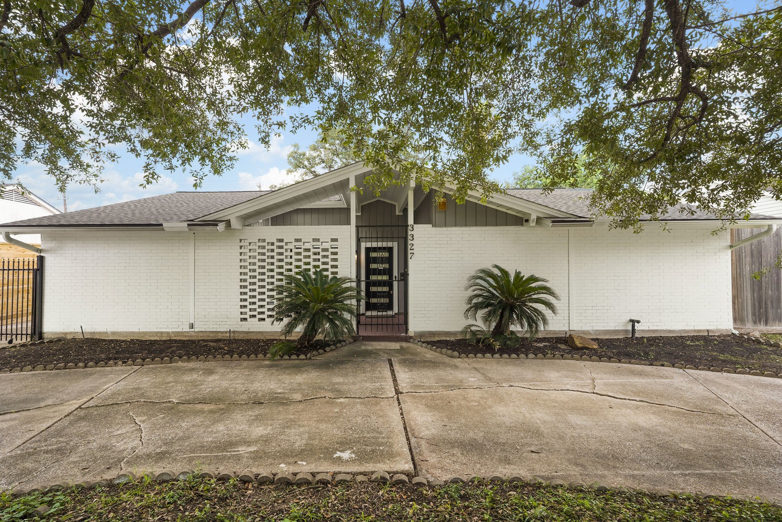 3327 Freshmeadows Drive Houston, TX 77063 - Photo 29 of 35 a view of a house with a yard