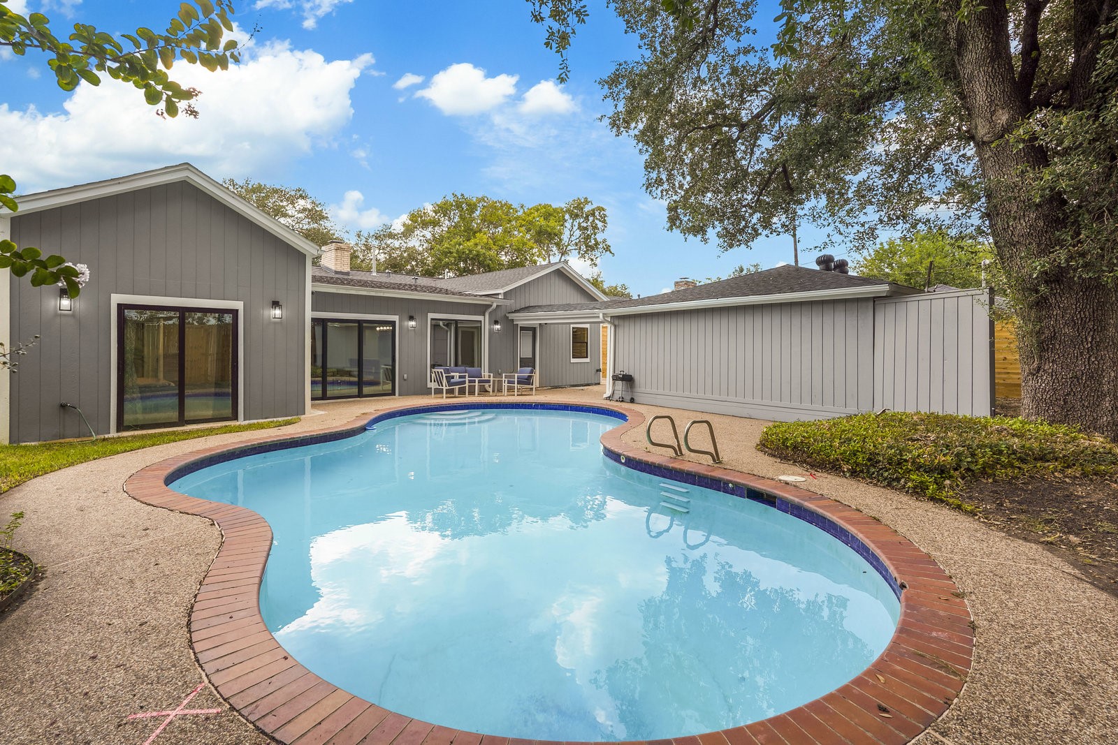 3327 Freshmeadows Drive Houston, TX 77063 - Photo 5 of 35 a view of a house with swimming pool