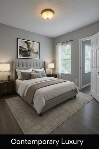 a bedroom with a bed and a night stand