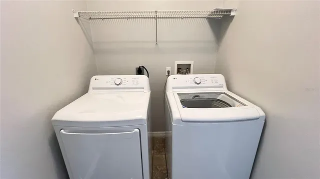 a utility room with dryer and washer