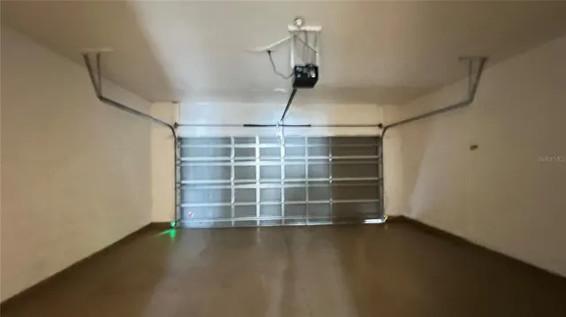 a view of swimming pool from a balcony