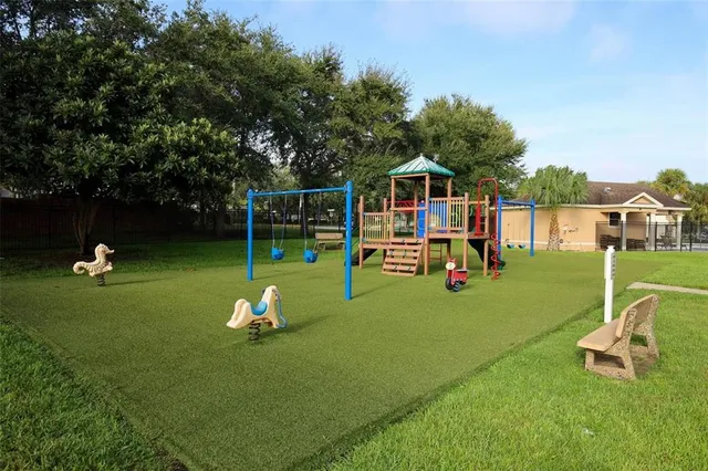 an aerial view of a house with a swimming pool