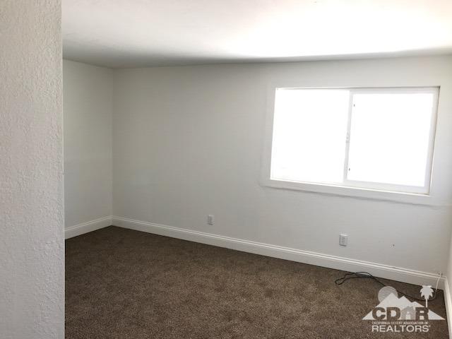 8856 Little Morongo Road Morongo Valley, CA 92256 - Photo 29 of 37 an empty room with a window