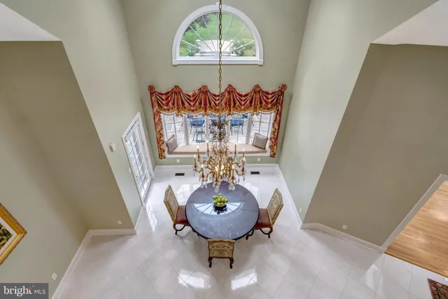 a room with furniture and a chandelier