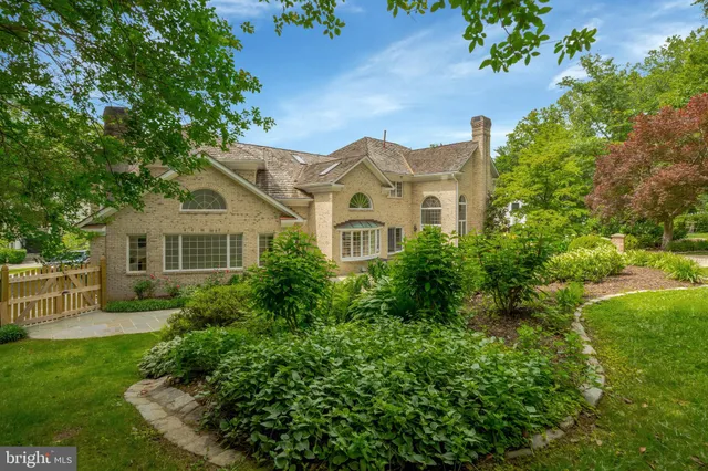 a view of a patio with furniture and a potted plant