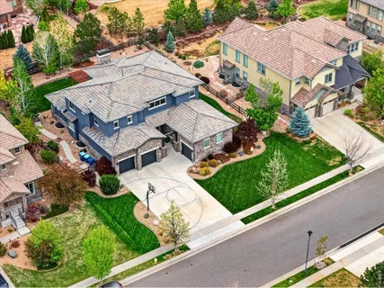 an aerial view of a house with a garden