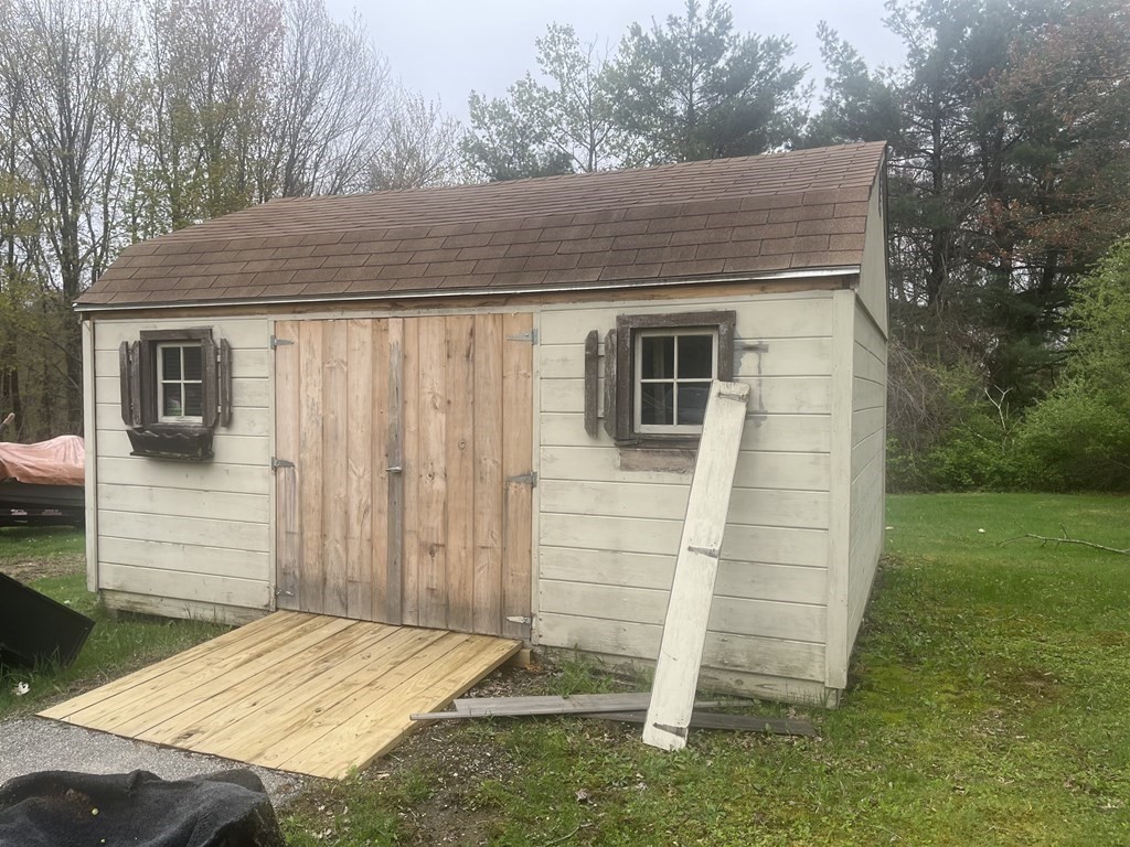 30 Podunk Road Sturbridge, MA 01566 - Photo 12 of 13 a backyard of a house