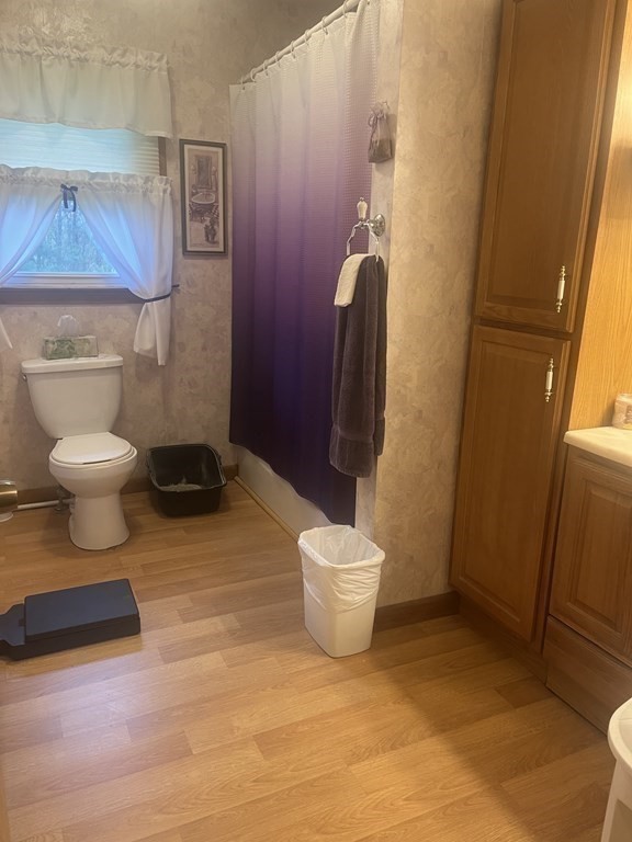 30 Podunk Road Sturbridge, MA 01566 - Photo 6 of 13 a bathroom with a sink and a toilet